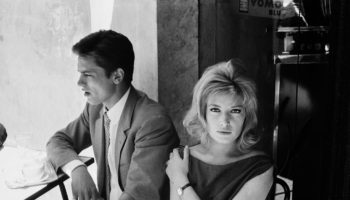 Alain Delon and Monica Vitti during a break on the set of _Eclipse_. Rome, 1961